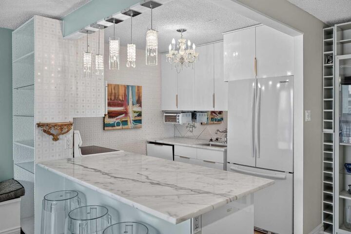 Property Photo:  718 12 Avenue SW 408  AB T2R 0H7 