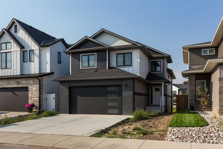 Property Photo: 561 Malahat Green W AB T1J 5H1