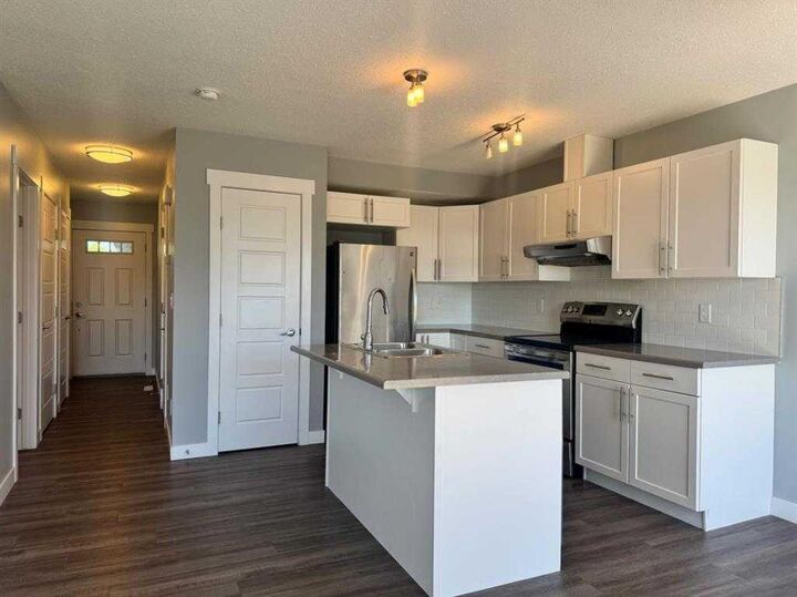 Property Photo:  8453 101 Avenue  AB T8X 0R1 