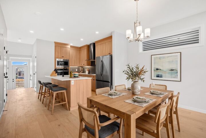 Property Photo: 109 Creekview Manor SW AB T2X 5Y1