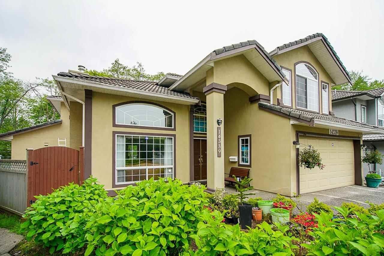 Property Photo:  14339 74A Avenue  BC V3W 4C6 
