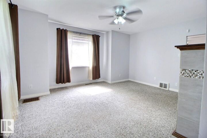 Property Photo: 11626 87 Street NW AB T5B 3M5