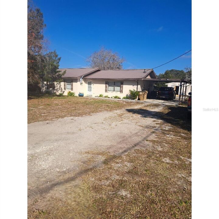 Property Photo:  11301 Huggins Street  FL 34788 