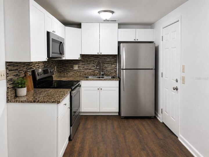 Property Photo: 2318 E 111th Ave FL 33612
