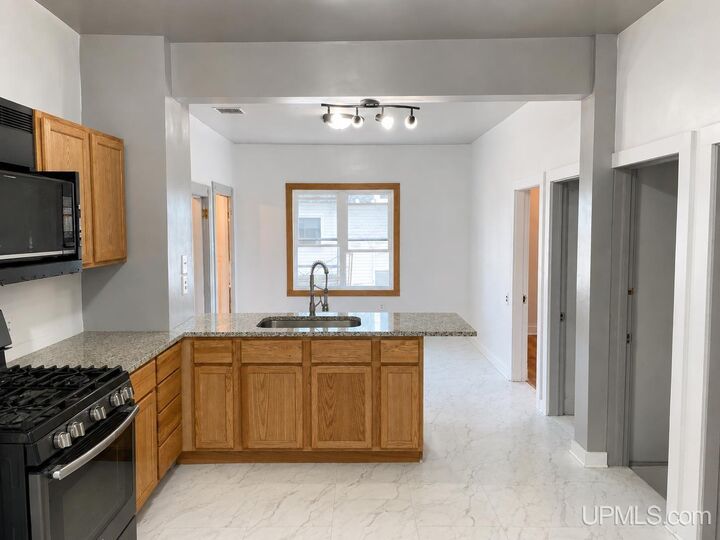 Property Photo:  1105 Minnesota Street  MI 49930 