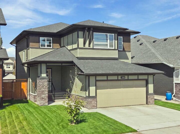 Property Photo: 308 Coopersfield Rise SW AB T4B 4K7