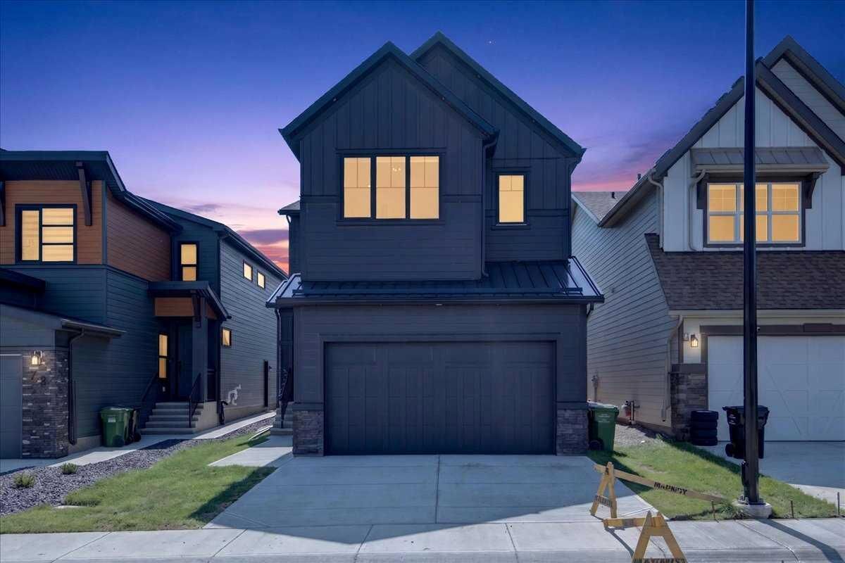 Property Photo: 77 Rowmont Common NW AB T3L 0L2