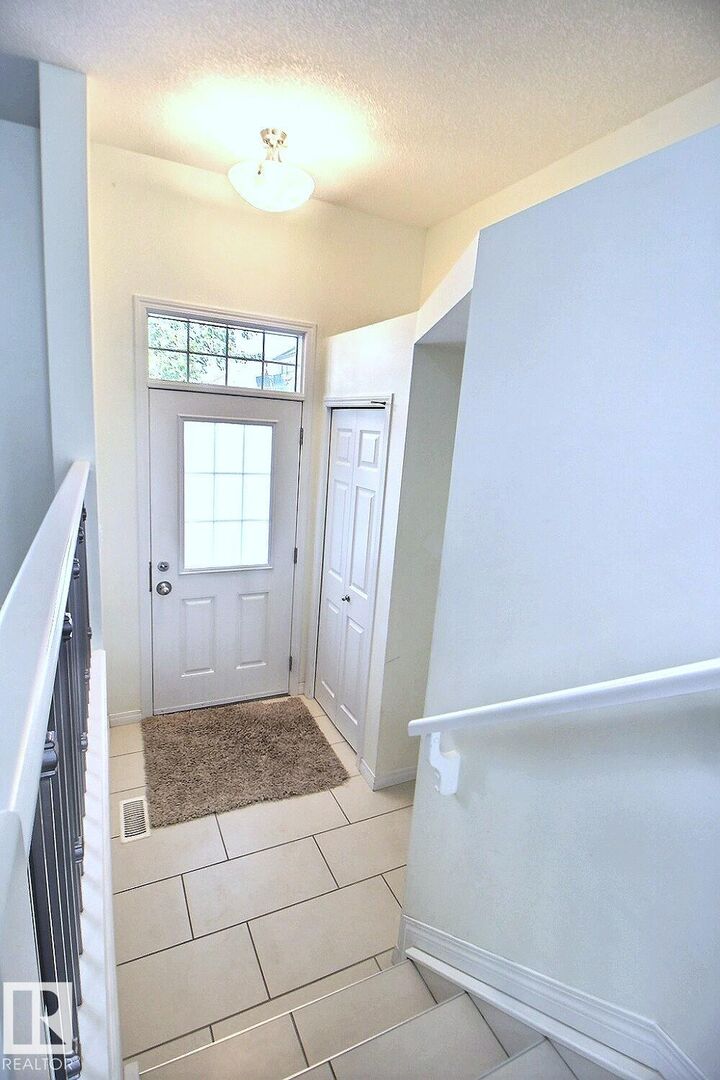 Property Photo:  4850 Terwillegar Common NW 18  AB T6R 0T6 