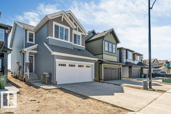 Property Photo:  1116 Cristall Crescent SW  AB T6W 5S9 
