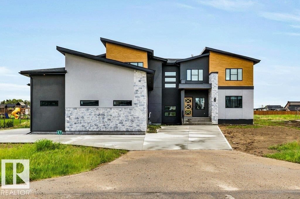 Property Photo: 26409 Twp Rd 532A 47 AB T7X 0W7