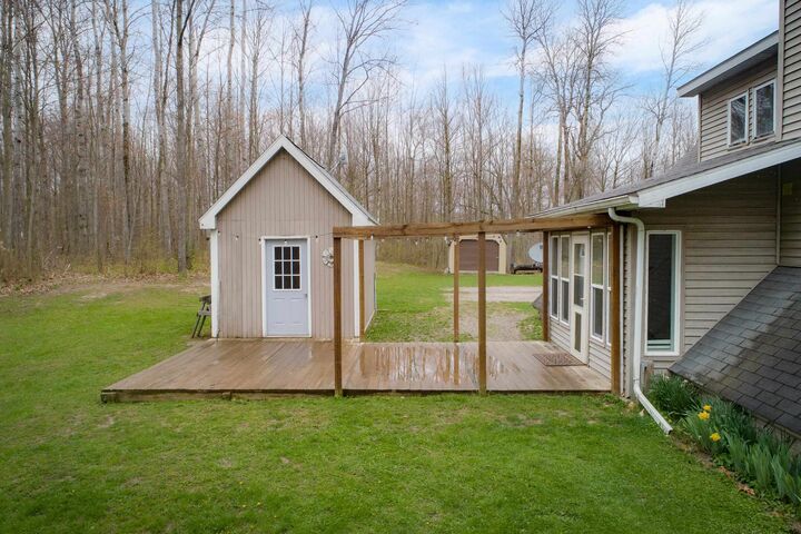Property Photo:  1180 Winding Wood  MI 48622 