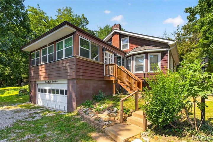 Property Photo:  1439 Grant Road  MO 63119 