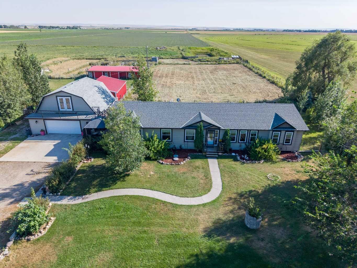 Property Photo: 213037 Twp Rd 64 AB T0K 2N0