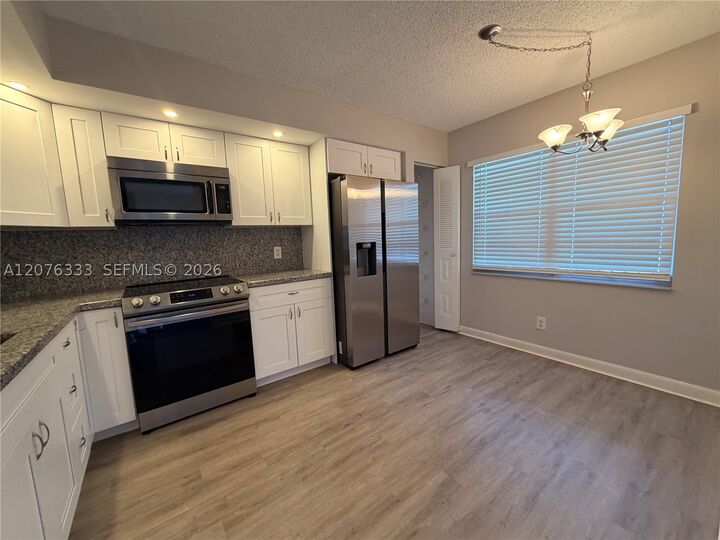 Property Photo:  901 SW 128th Ter 212A  FL 33027 