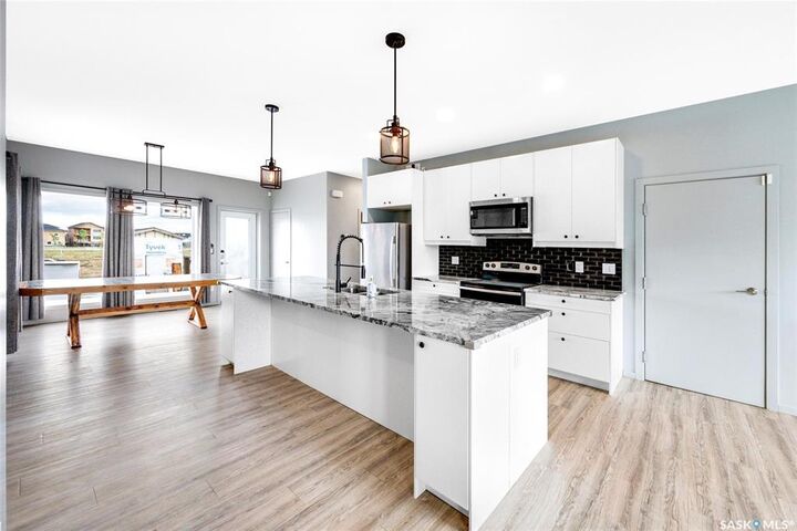 Property Photo:  342 Kenaschuk Lane  SK S7W 0Y5 