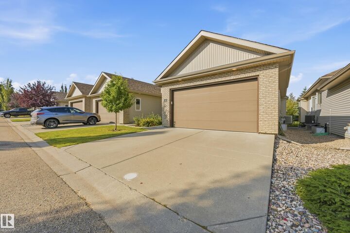 Property Photo:  700 Regency Drive 56  AB T8A 6N3 