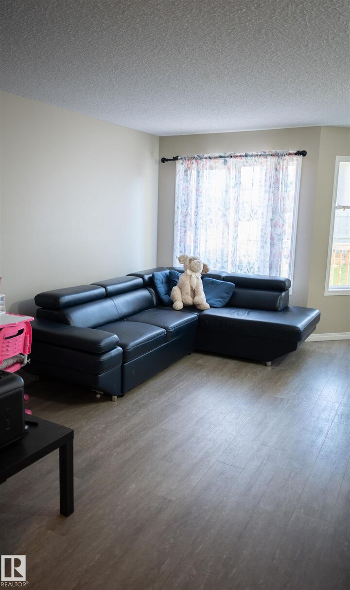Property Photo:  9014 Cooper Link Link SW  AB T6W 4A5 