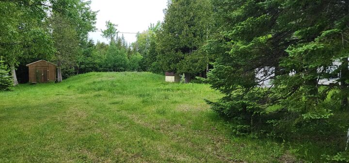 Property Photo:  26928 Point Aux Frenes Rd  MI 49736 