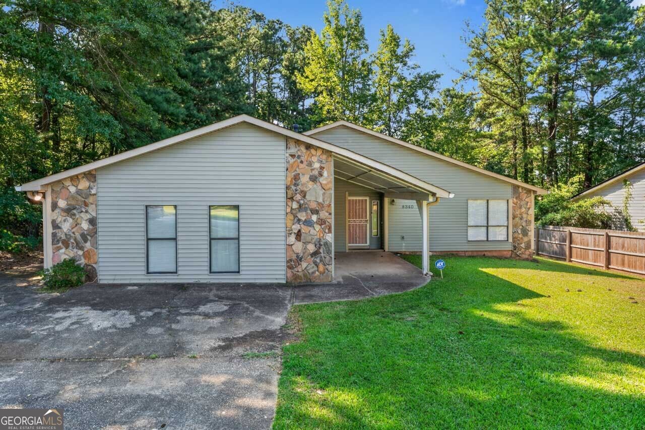 Property Photo:  8340 Beechwood Trace  GA 30274 