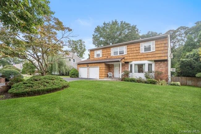 Property Photo:  14 Format Lane  NY 11787 