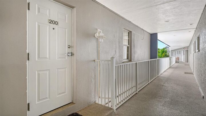 Property Photo:  3453 Gulf Of Mexico Drive 200  FL 34228 