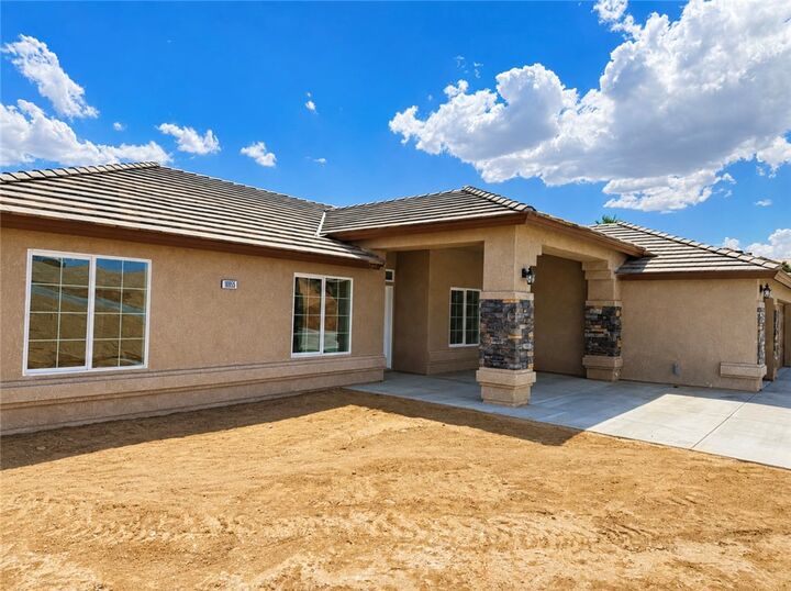 Property Photo:  10955 E Avenue  CA 92345 