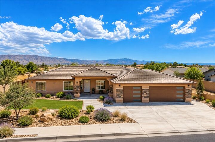 Property Photo:  10955 E Avenue  CA 92345 