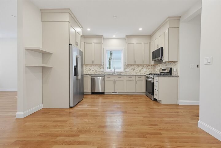 Property Photo:  53 Eddy St. 1  MA 02465 