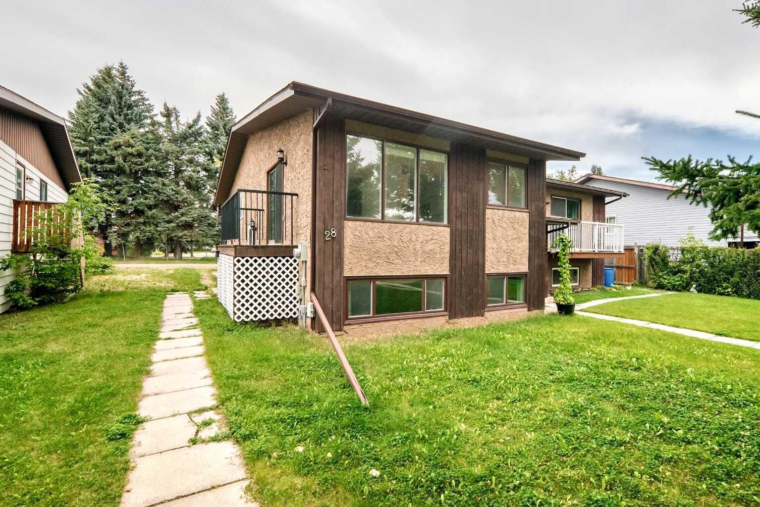 Property Photo:  28 Woodland Drive  AB T4L 1V1 