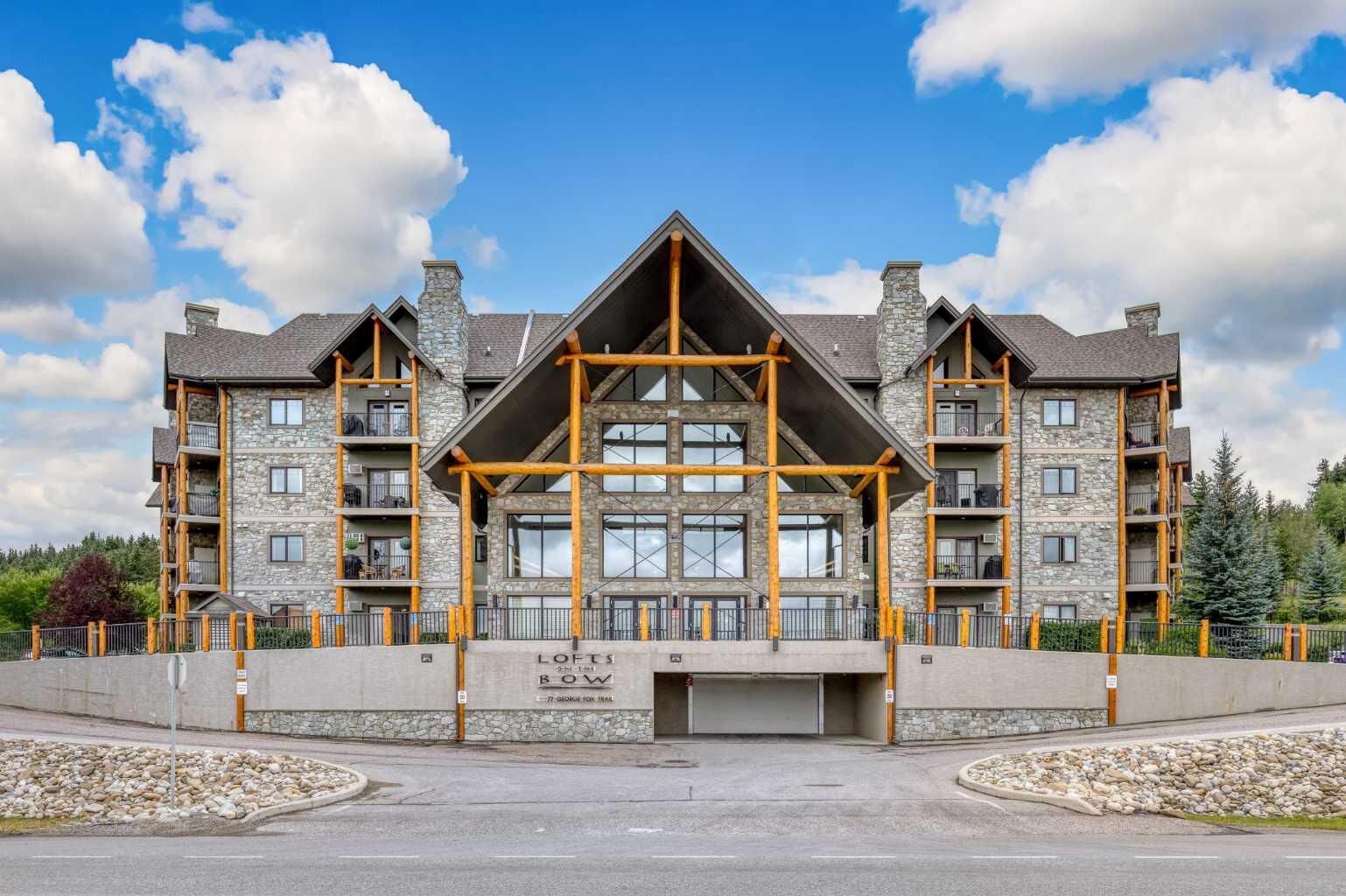 Property Photo:  77 George Fox Trail W 117  AB T4C 0N1 