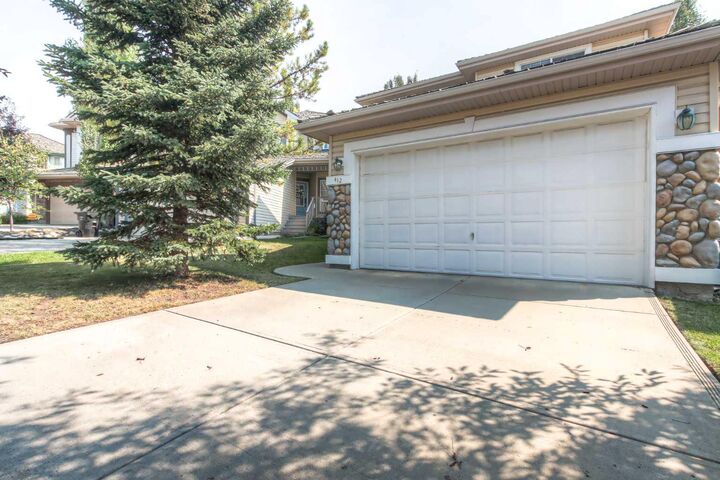 Property Photo:  412 Springbank Place SW  AB T3H 4J6 