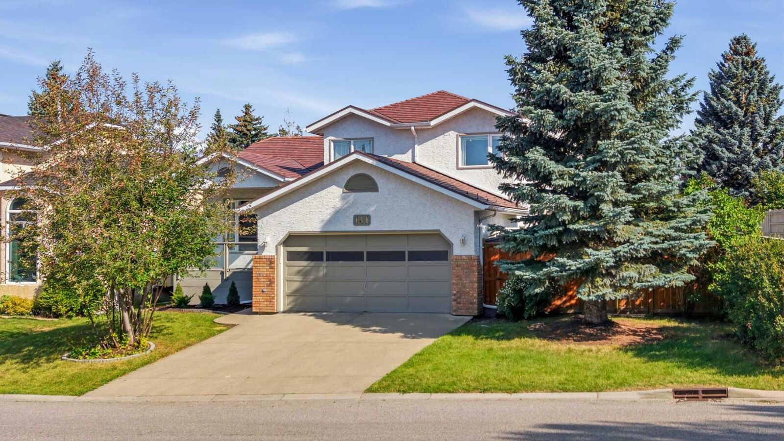 Property Photo:  141 Woodbrook Road SW  AB T2W 6C6 