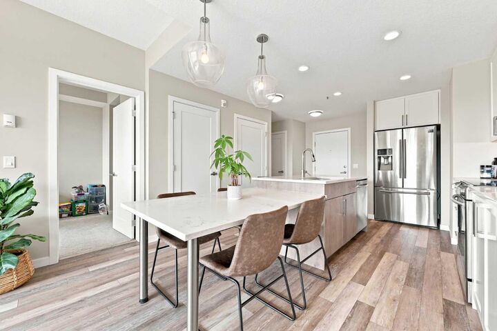Property Photo: 8530 8A Avenue SW 320 AB T3H 6A7