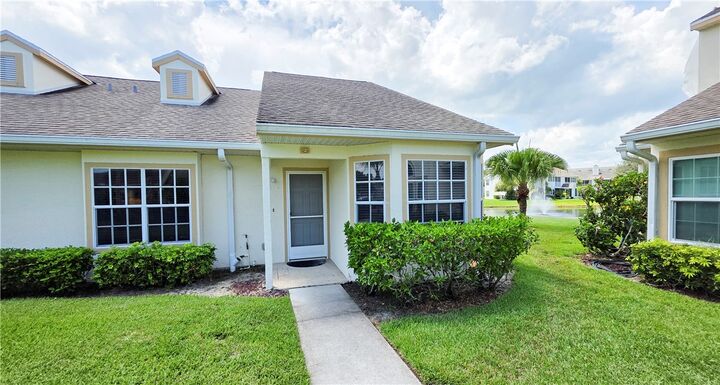 Property Photo:  1827 Aynsley Way 2-27  FL 32966 
