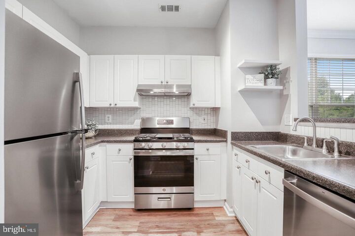 Property Photo:  11326 Aristotle Drive 4-202  VA 22030 