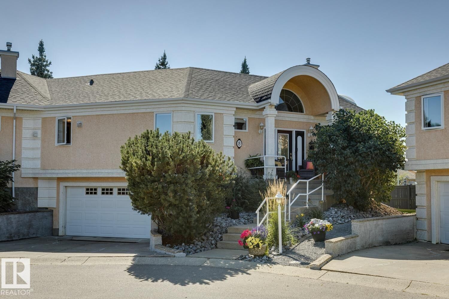Property Photo:  #8 11809 9B Av NW  AB T6J 7B6 