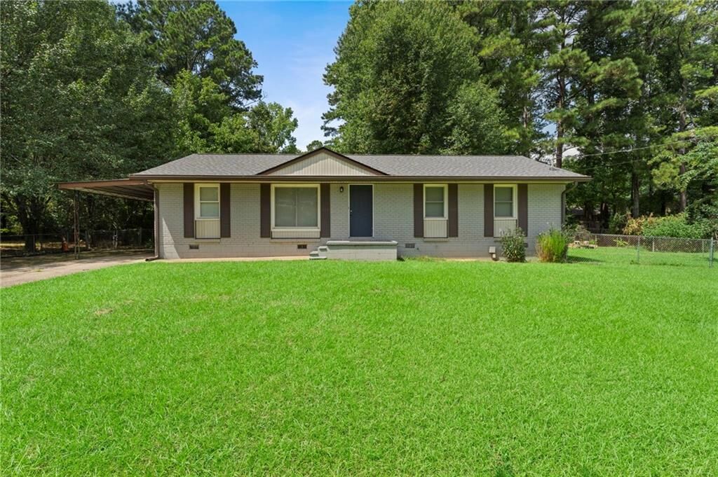 Property Photo:  8839 Channing Drive  GA 30238 