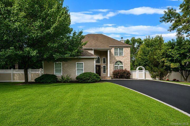 Property Photo:  44 Independence Way  NY 11764 