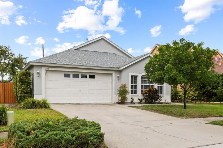 Property Photo: 1702 Meadow Oak Lane FL 34689