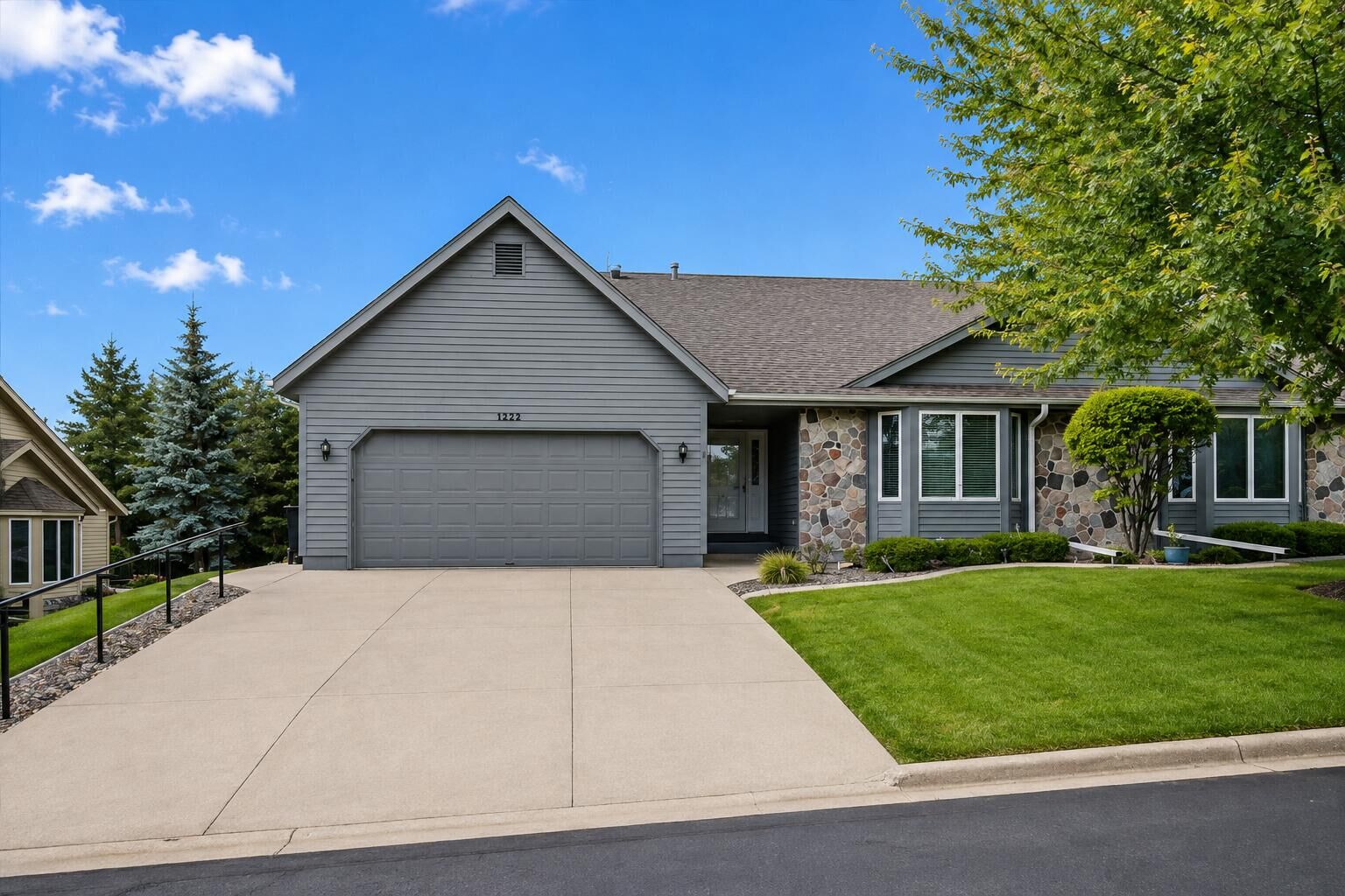 Property Photo:  1222 Hidden Fields Dr  WI 53095 