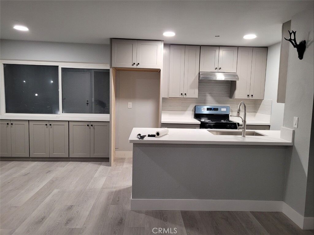 Property Photo: 15233 Santa Gertrudes Avenue V104 CA 90638
