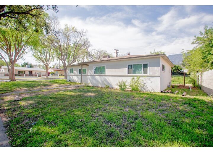 Property Photo:  496 W 48th  CA 92407 