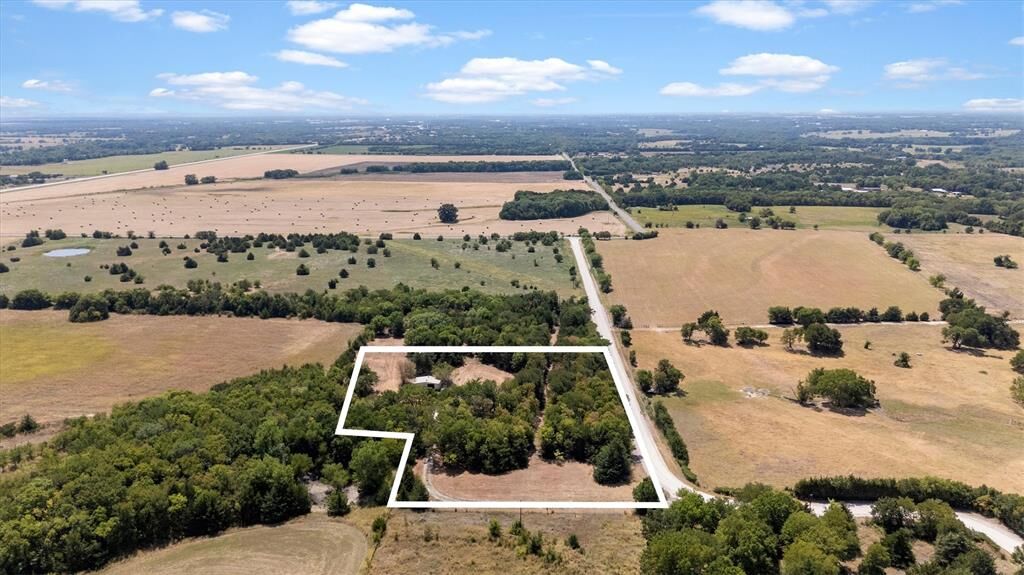 Property Photo: 9999 County Road 936 TX 75409