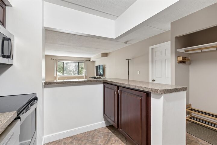Property Photo:  4975 Washington St 209  MA 02132 