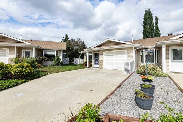 Property Photo:  4634 42 Street Crescent  AB T4N 6Y6 