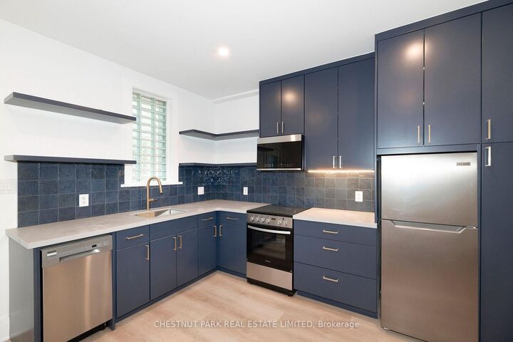 Property Photo:  1105 Queen Street E Main  ON M4M 1K7 