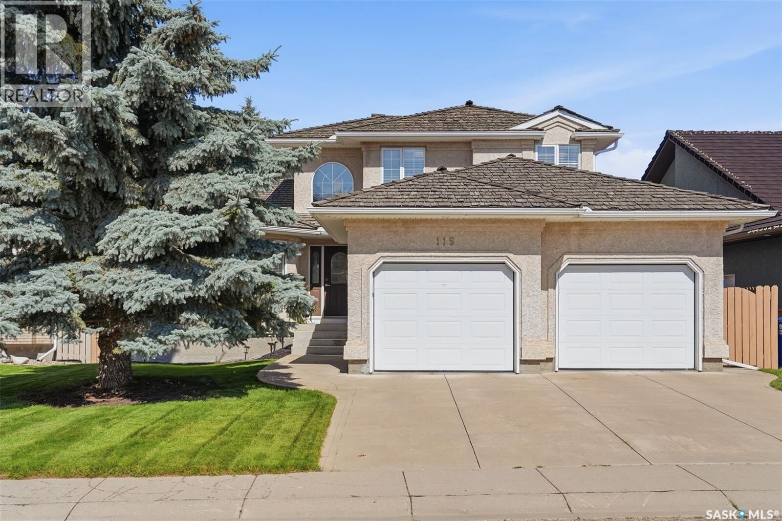 Property Photo:  115 Braeshire Lane  SK S7V 1A1 