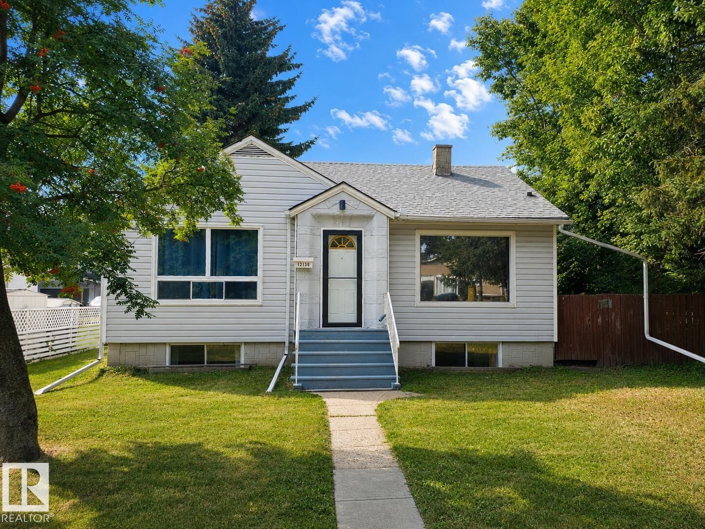 Property Photo:  12130 124 Street NW  AB T5L 0M9 