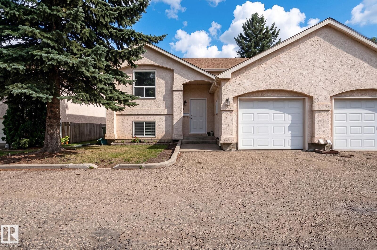 Property Photo: 1817 Mill Woods Road NW AB T6L 6K2