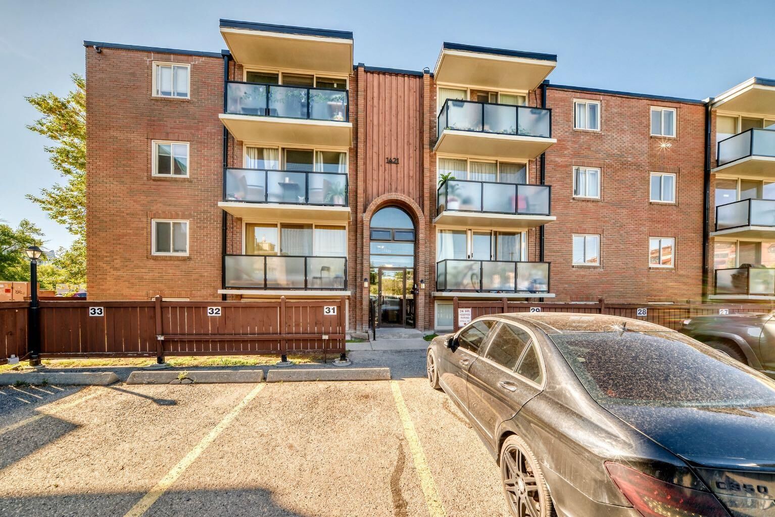 Property Photo:  1421 7 Avenue NW 232  AB T2N 0Z3 